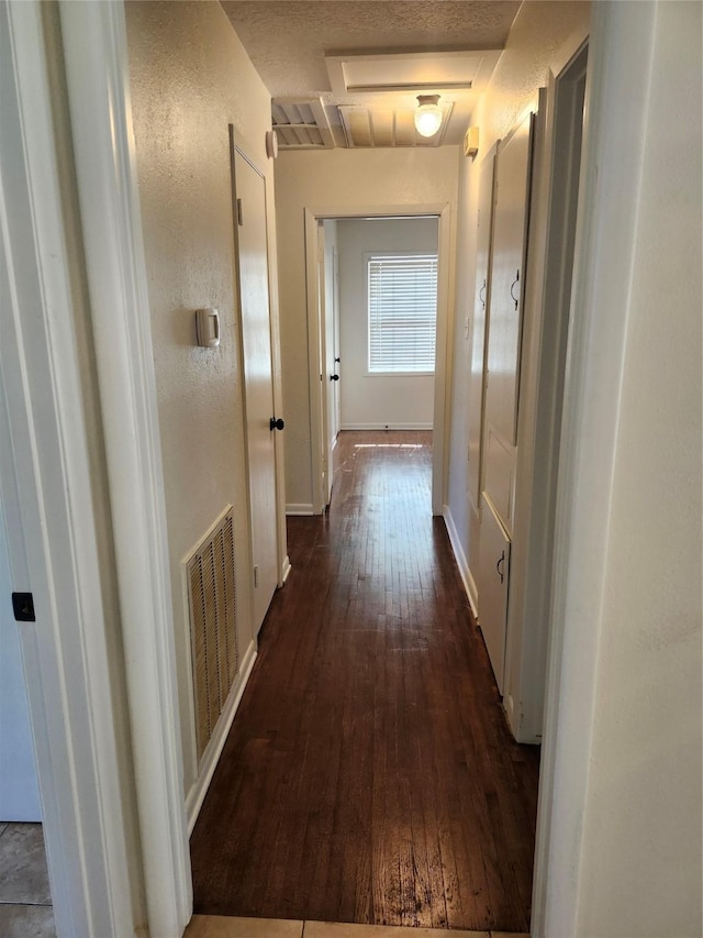 hall featuring dark hardwood / wood-style floors