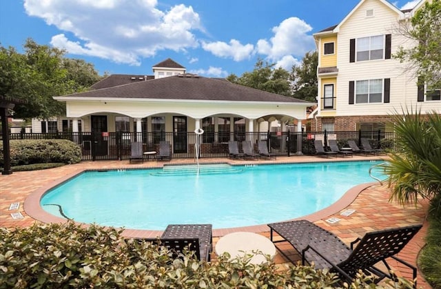 view of pool featuring a patio area