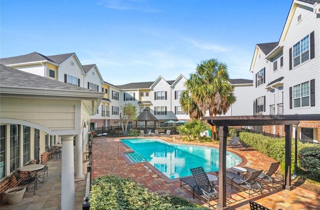 view of pool featuring a patio area