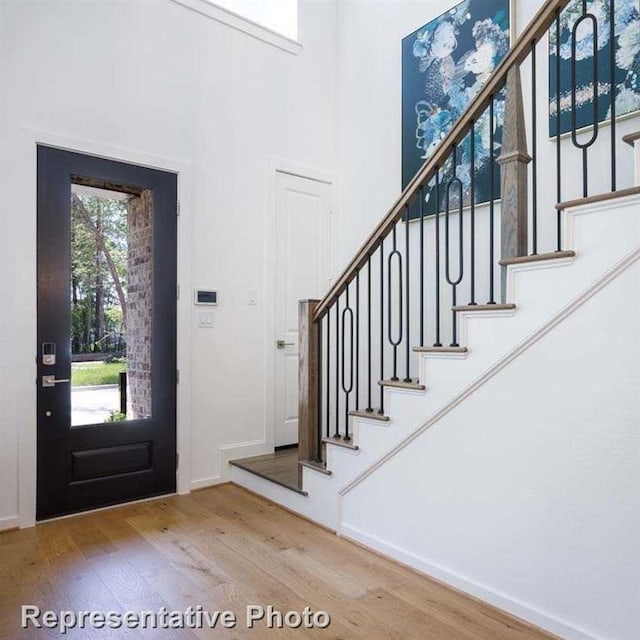 foyer with hardwood / wood-style flooring