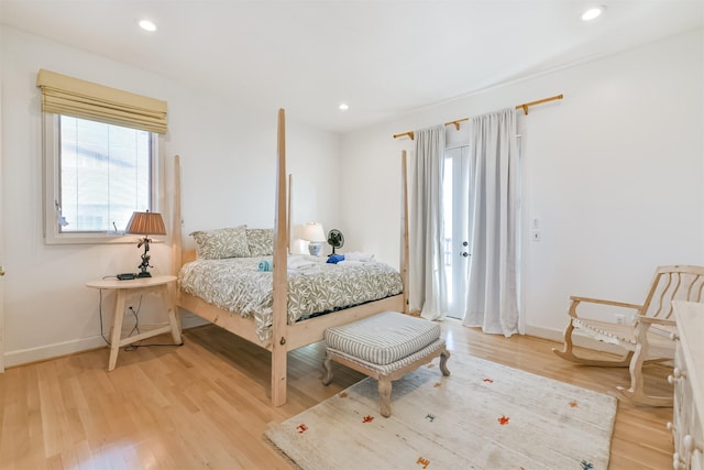 bedroom with light hardwood / wood-style floors