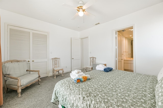 bedroom featuring connected bathroom, ceiling fan, a closet, and carpet floors