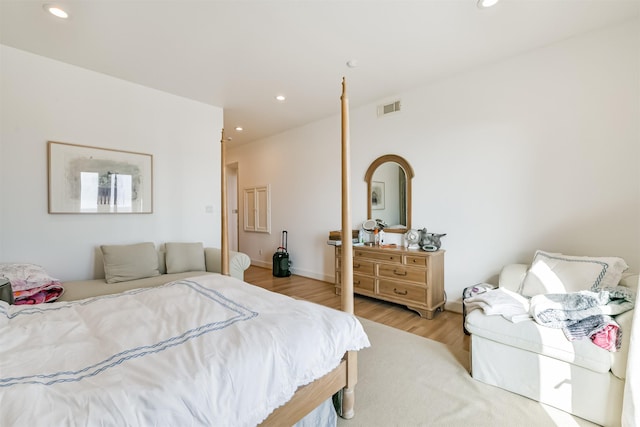 bedroom with light hardwood / wood-style flooring