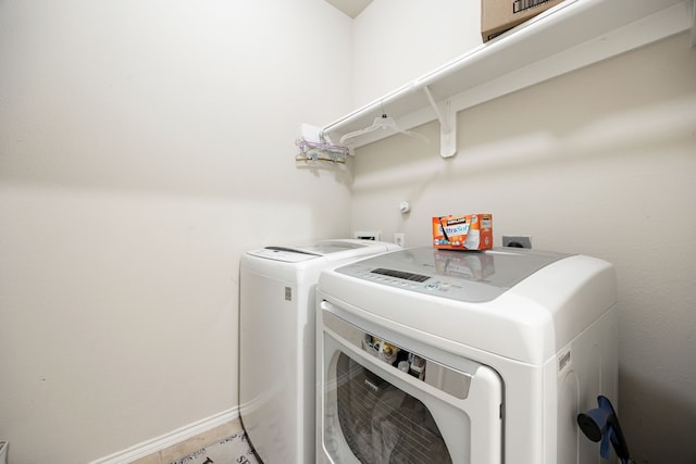 laundry room featuring washing machine and dryer