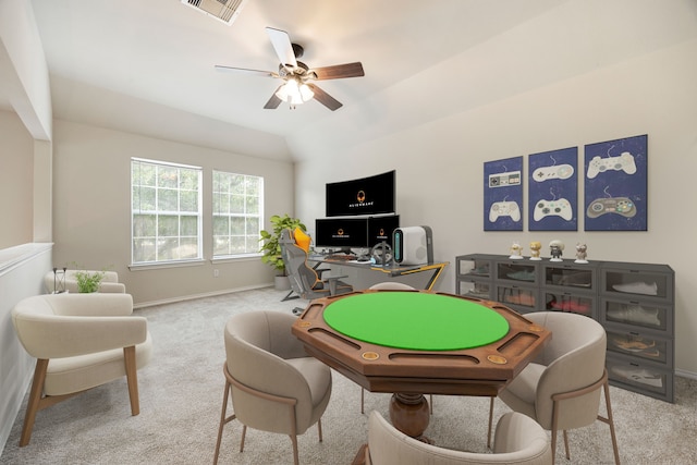 rec room with light carpet, vaulted ceiling, and ceiling fan