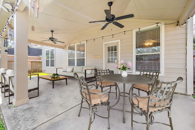 view of patio with outdoor lounge area and ceiling fan