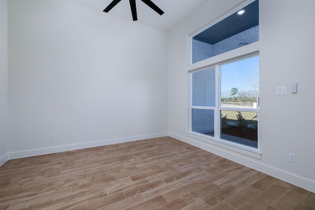 unfurnished room with ceiling fan