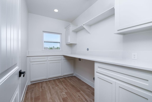 laundry room featuring light hardwood / wood-style flooring