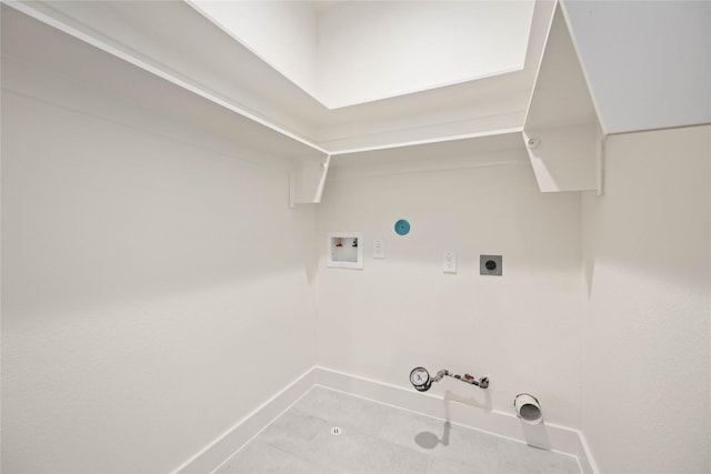 clothes washing area featuring gas dryer hookup, hookup for a washing machine, light tile patterned floors, and hookup for an electric dryer