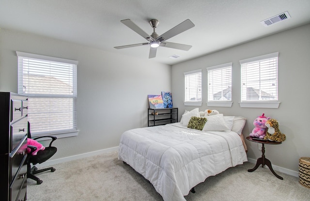 carpeted bedroom featuring ceiling fan