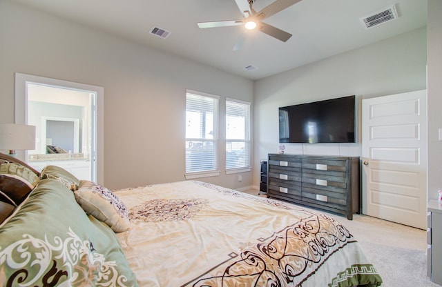 bedroom featuring ceiling fan and light carpet