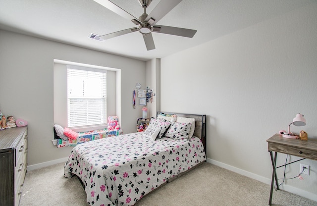 carpeted bedroom with ceiling fan