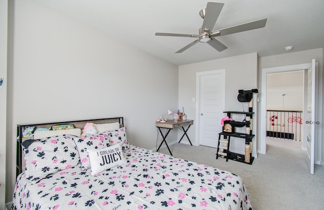 bedroom with ceiling fan and light colored carpet