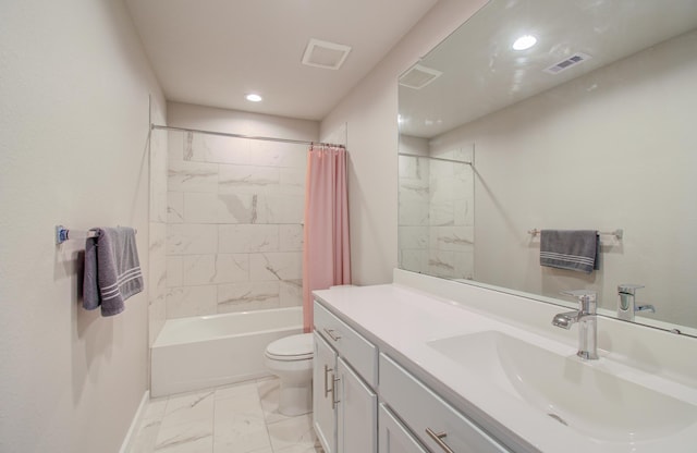 full bathroom with vanity, toilet, and shower / tub combo with curtain