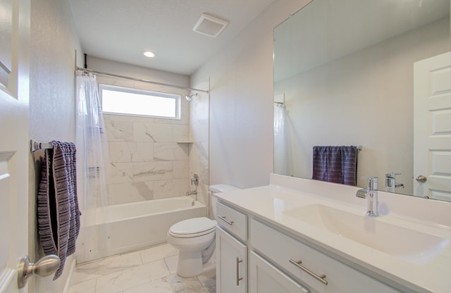 full bathroom with toilet, vanity, and shower / tub combo with curtain