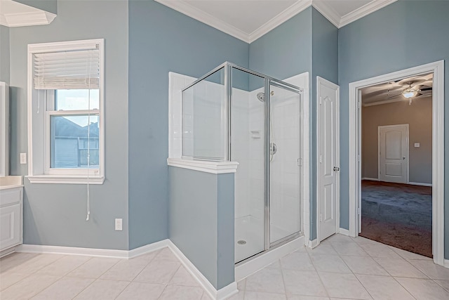 bathroom with tile patterned floors, ceiling fan, and a shower with shower door