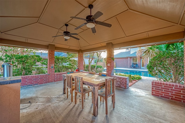 view of patio featuring ceiling fan