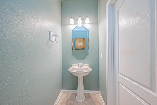 bathroom featuring tile patterned flooring