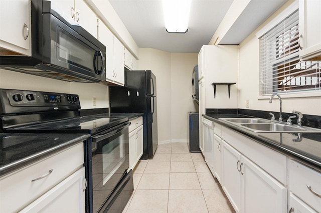 kitchen with black appliances, white cabinetry, sink, and light tile patterned floors