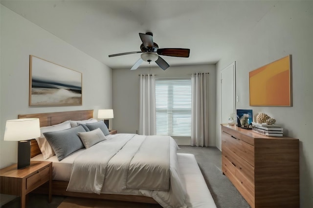 bedroom with light colored carpet and ceiling fan