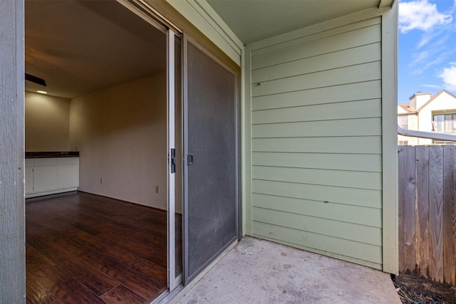 property entrance with a balcony