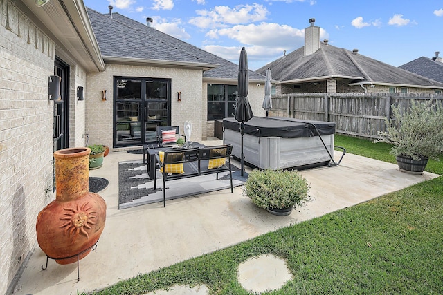 view of patio with a hot tub