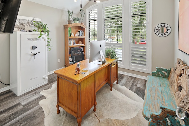 office featuring light wood-type flooring and vaulted ceiling