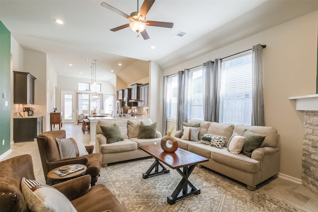 29614 Sterling Knoll Dr, Fulshear, TX 77441 - living room with a healthy amount of sunlight, vaulted ceiling, a ceiling fan, and visible vents