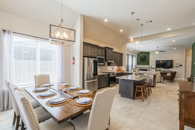 29614 Sterling Knoll Dr, Fulshear, TX 77441 - dining room featuring recessed lighting, visible vents, plenty of natural light, and ceiling fan with notable chandelier