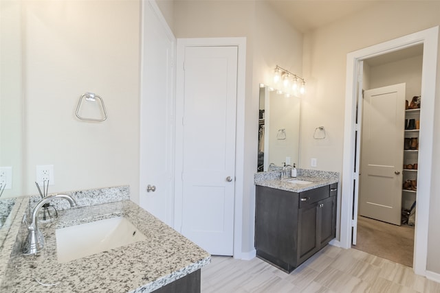 29614 Sterling Knoll Dr, Fulshear, TX 77441 - full bath featuring a sink and two vanities