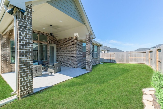 29614 Sterling Knoll Dr, Fulshear, TX 77441 - view of yard with a fenced backyard, an outdoor hangout area, a patio, and ceiling fan