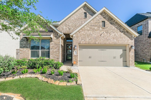 29614 Sterling Knoll Dr, Fulshear, TX 77441 - view of front of house with brick siding, an attached garage, and concrete driveway