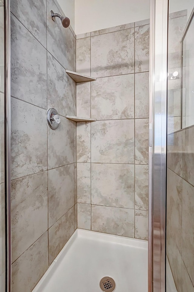 bathroom featuring walk in shower