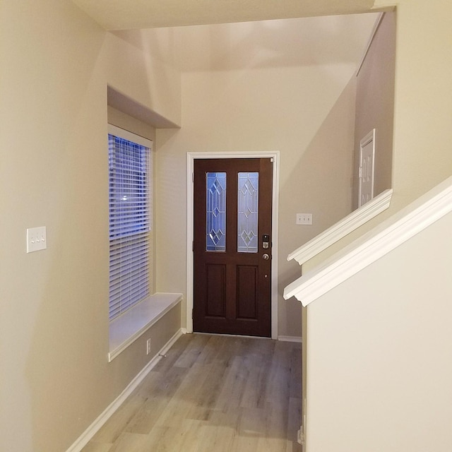 foyer entrance featuring light wood-type flooring