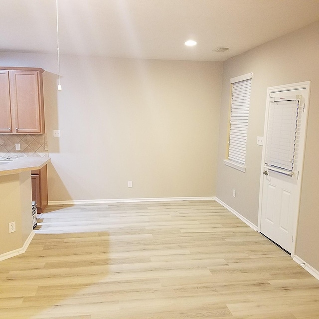 interior space with light hardwood / wood-style floors