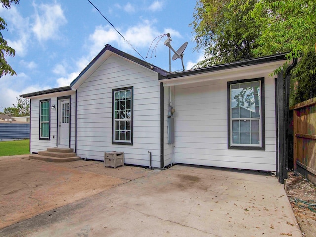 rear view of house featuring a patio area