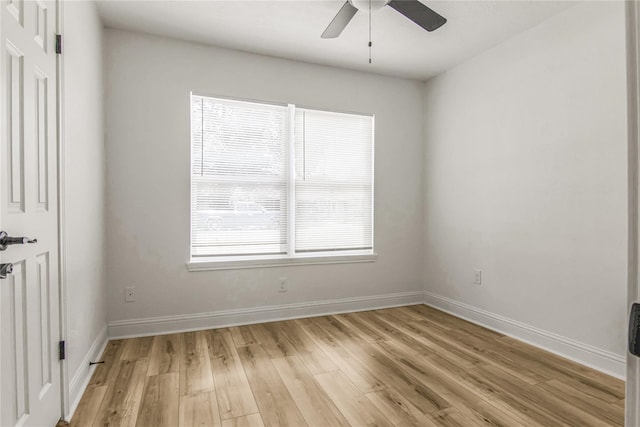 empty room with light hardwood / wood-style floors and ceiling fan