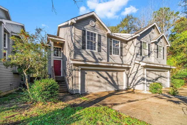 view of front of property with a garage