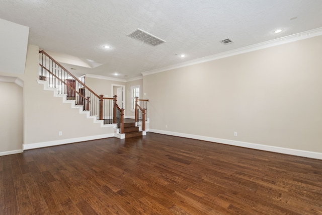 interior space featuring crown molding, dark wood-type flooring, and a textured ceiling