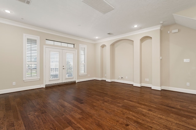 unfurnished room featuring dark hardwood / wood-style floors, crown molding, and french doors