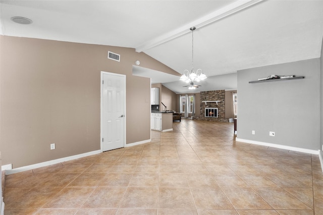 unfurnished living room with a fireplace, light tile patterned floors, vaulted ceiling with beams, and an inviting chandelier