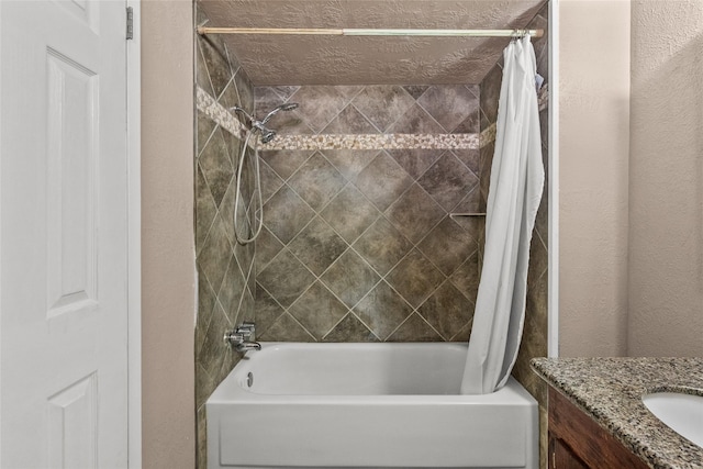 bathroom featuring vanity and shower / bath combo with shower curtain