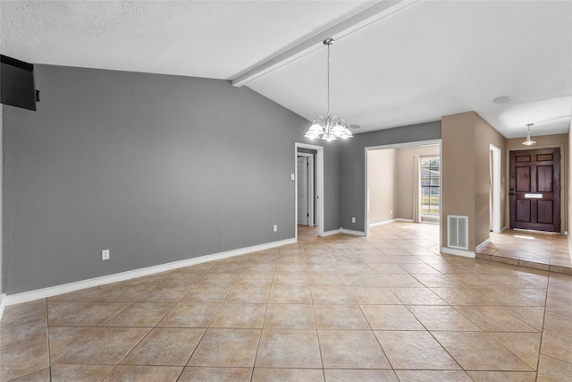 interior space with vaulted ceiling with beams, light tile patterned floors, a textured ceiling, and an inviting chandelier