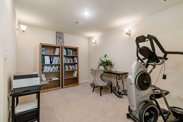 workout area with light colored carpet