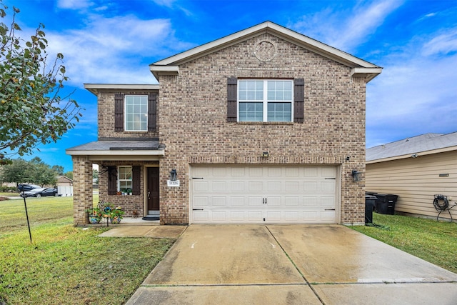 view of front property with a garage and a front lawn