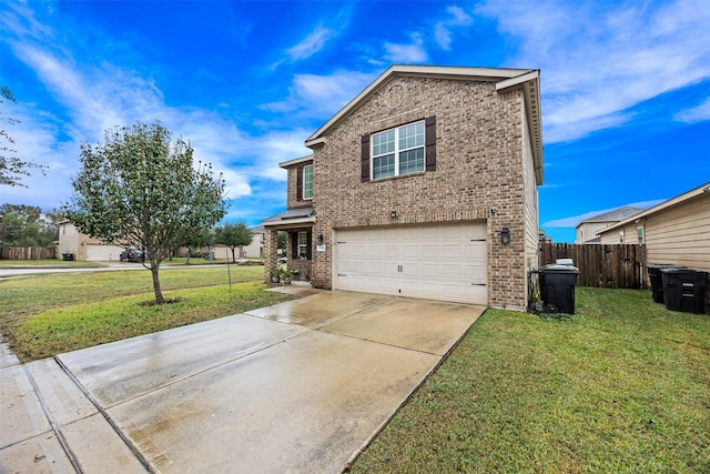 view of front of home featuring a front lawn and a garage