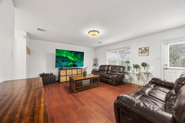 living room with dark wood-type flooring