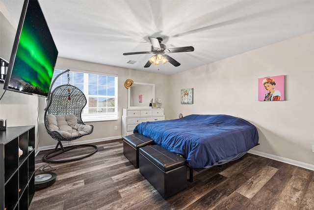 bedroom featuring hardwood / wood-style flooring and ceiling fan