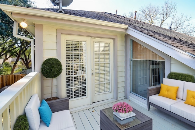 wooden terrace with outdoor lounge area