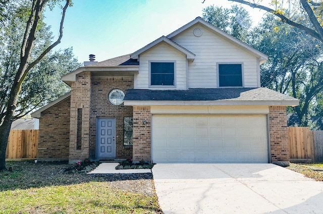 view of front of property featuring a garage